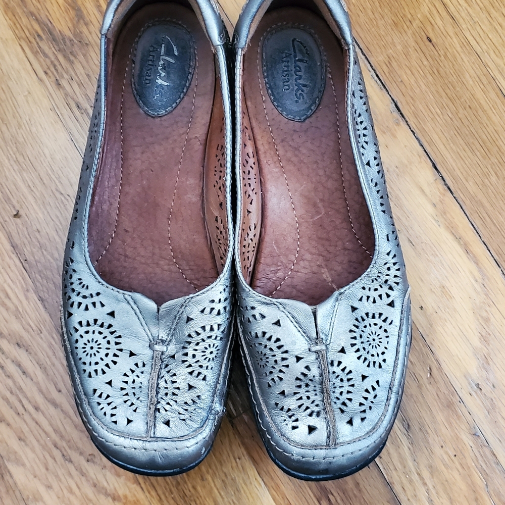 Clark's slip on leather flats. Gold